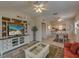 Cozy living room featuring comfy seating and built-in shelving at 18 Heilwood St, Clearwater Beach, FL 33767