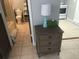 Bedroom with nightstand and dresser, near bathroom at 18 Heilwood St, Clearwater Beach, FL 33767