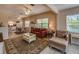 Living room with fireplace and comfy seating at 18 Heilwood St, Clearwater Beach, FL 33767
