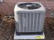 New gray AC unit with hurricane straps at 3838 37Th S St # 57, St Petersburg, FL 33711