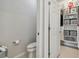 Convenient water closet with access to a large closet at 9309 Rally Spring Loop, Wesley Chapel, FL 33545