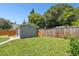 Large backyard with a storage shed and wooden fence at 4320 3Rd N Ave, St Petersburg, FL 33713