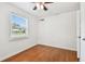 Charming bedroom with hardwood floors and a window at 4320 3Rd N Ave, St Petersburg, FL 33713