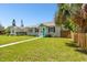 Quaint house with teal door and neatly kept lawn at 4320 3Rd N Ave, St Petersburg, FL 33713
