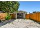 Garage with open door, revealing a gravel driveway at 4320 3Rd N Ave, St Petersburg, FL 33713