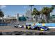 Two Indy cars racing on a street course at 4320 3Rd N Ave, St Petersburg, FL 33713