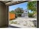 View from garage showing backyard with gravel driveway and fenced area at 4320 3Rd N Ave, St Petersburg, FL 33713