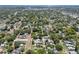 Aerial view showing house and neighborhood with waterfront view in the background at 4320 3Rd N Ave, St Petersburg, FL 33713