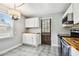 Bright kitchen with white cabinets, wood countertops, and stainless steel appliances at 4320 3Rd N Ave, St Petersburg, FL 33713