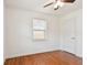 Bright bedroom with hardwood floors and ceiling fan at 4320 3Rd N Ave, St Petersburg, FL 33713