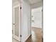 Bright hallway with hardwood floors and access to bedroom at 4320 3Rd N Ave, St Petersburg, FL 33713