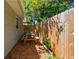 Relaxing backyard patio area with picnic table under a tree at 4320 3Rd N Ave, St Petersburg, FL 33713