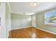Living room with hardwood floors and neutral-toned walls at 4320 3Rd N Ave, St Petersburg, FL 33713