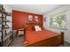 Cozy bedroom featuring a wooden bed frame and terracotta accents at 6199 59Th N Pl, St Petersburg, FL 33709