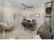 Bright and airy home office with built-in shelving and hardwood floors at 9249 Highland Hills Dr, Hudson, FL 34667