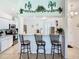 Beautiful kitchen featuring granite countertops, stainless steel appliances and breakfast bar seating at 11247 Corey Pavin Ln, San Antonio, FL 33576