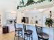 Beautiful kitchen featuring granite countertops, stainless steel appliances and breakfast bar seating at 11247 Corey Pavin Ln, San Antonio, FL 33576