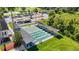 Aerial view of shuffleboard courts with benches and sunshades for players at 11247 Corey Pavin Ln, San Antonio, FL 33576