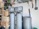 The home's utility room showing a Culligan water softener and other house hold equipment at 11247 Corey Pavin Ln, San Antonio, FL 33576