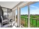 Relaxing balcony with scenic views of the golf course and bridge at 6269 Palma Del Mar S Blvd # 608, St Petersburg, FL 33715