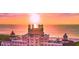 Pink building at sunset with ocean view at 6269 Palma Del Mar S Blvd # 608, St Petersburg, FL 33715