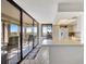 Kitchen with breakfast bar, white appliances, and access to a balcony at 6269 Palma Del Mar S Blvd # 608, St Petersburg, FL 33715