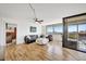 Bright living room with hardwood floors, comfy seating, and stunning water views at 6269 Palma Del Mar S Blvd # 608, St Petersburg, FL 33715