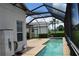 Screened pool with backyard access and golf course view at 10312 Cleghorn Dr, San Antonio, FL 33576