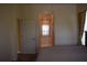 Bedroom with view into bathroom and pool at 10312 Cleghorn Dr, San Antonio, FL 33576