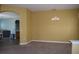 Dining room with light-colored walls and carpet at 10312 Cleghorn Dr, San Antonio, FL 33576