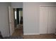 Bedroom with access to another room and a large closet at 10312 Cleghorn Dr, San Antonio, FL 33576