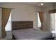Spacious bedroom with sliding glass doors leading to a pool view at 10312 Cleghorn Dr, San Antonio, FL 33576