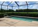 Screened pool and spa with tranquil golf course views at 10312 Cleghorn Dr, San Antonio, FL 33576