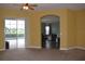 Open living room with view to the pool and backyard at 10312 Cleghorn Dr, San Antonio, FL 33576
