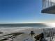 Beautiful Gulf view from this beach condo with a glimpse of a beachfront pool at 5830 Midnight Pass Rd # 705, Sarasota, FL 34242