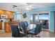 Eat-in-kitchen and dining area with view of the beach and Gulf at 5830 Midnight Pass Rd # 705, Sarasota, FL 34242