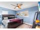 Spacious main bedroom with king-size bed and large window at 4984 Oxford N Ave, St Petersburg, FL 33710