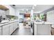 Open concept kitchen with island and stainless appliances at 4984 Oxford N Ave, St Petersburg, FL 33710