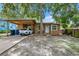 Well-maintained home with carport parking and yard at 4984 Oxford N Ave, St Petersburg, FL 33710