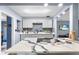Modern kitchen with white cabinets and quartz countertops at 4984 Oxford N Ave, St Petersburg, FL 33710
