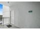 White building exterior with balconies and ocean views at 5830 Midnight Pass Rd # 705, Sarasota, FL 34242