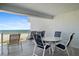 Balcony with ocean view and outdoor seating at 5830 Midnight Pass Rd # 705, Sarasota, FL 34242