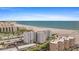 Aerial view of beach front property with parking and ocean view at 5830 Midnight Pass Rd # 705, Sarasota, FL 34242