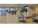 Building Lobby with seating and elevators at 1651 Sand Key Estates Ct # 74, Clearwater Beach, FL 33767