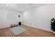 Bright home gym with light wood floors and plenty of space at 4134 Huntington Ne St, St Petersburg, FL 33703