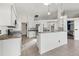 Modern kitchen with stainless steel appliances and granite countertops at 7162 Benson St, Englewood, FL 34224