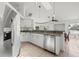 Modern kitchen with stainless steel appliances and granite countertops at 7162 Benson St, Englewood, FL 34224