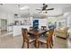 Bright kitchen features a breakfast bar and dining area at 7162 Benson St, Englewood, FL 34224