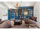 Cozy library with built-in shelves and leather seating at 7162 Benson St, Englewood, FL 34224