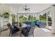 Spacious sunroom with dining area and plenty of natural light at 7162 Benson St, Englewood, FL 34224